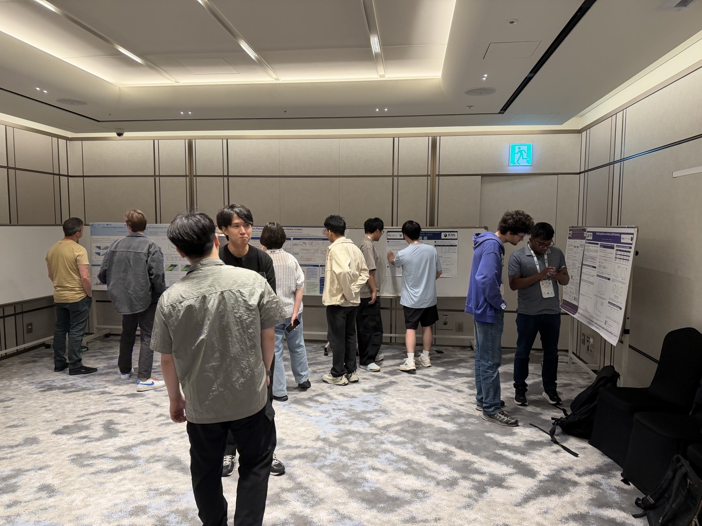Attendees viewing posters at the ICML Protocol Learning workshop