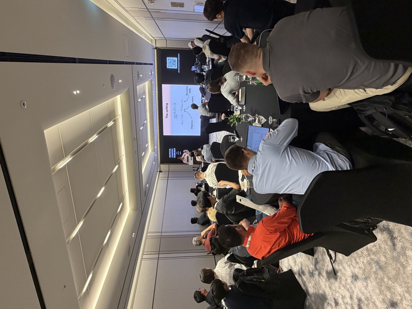 A full room of attendees at the ICML Protocol Learning workshop