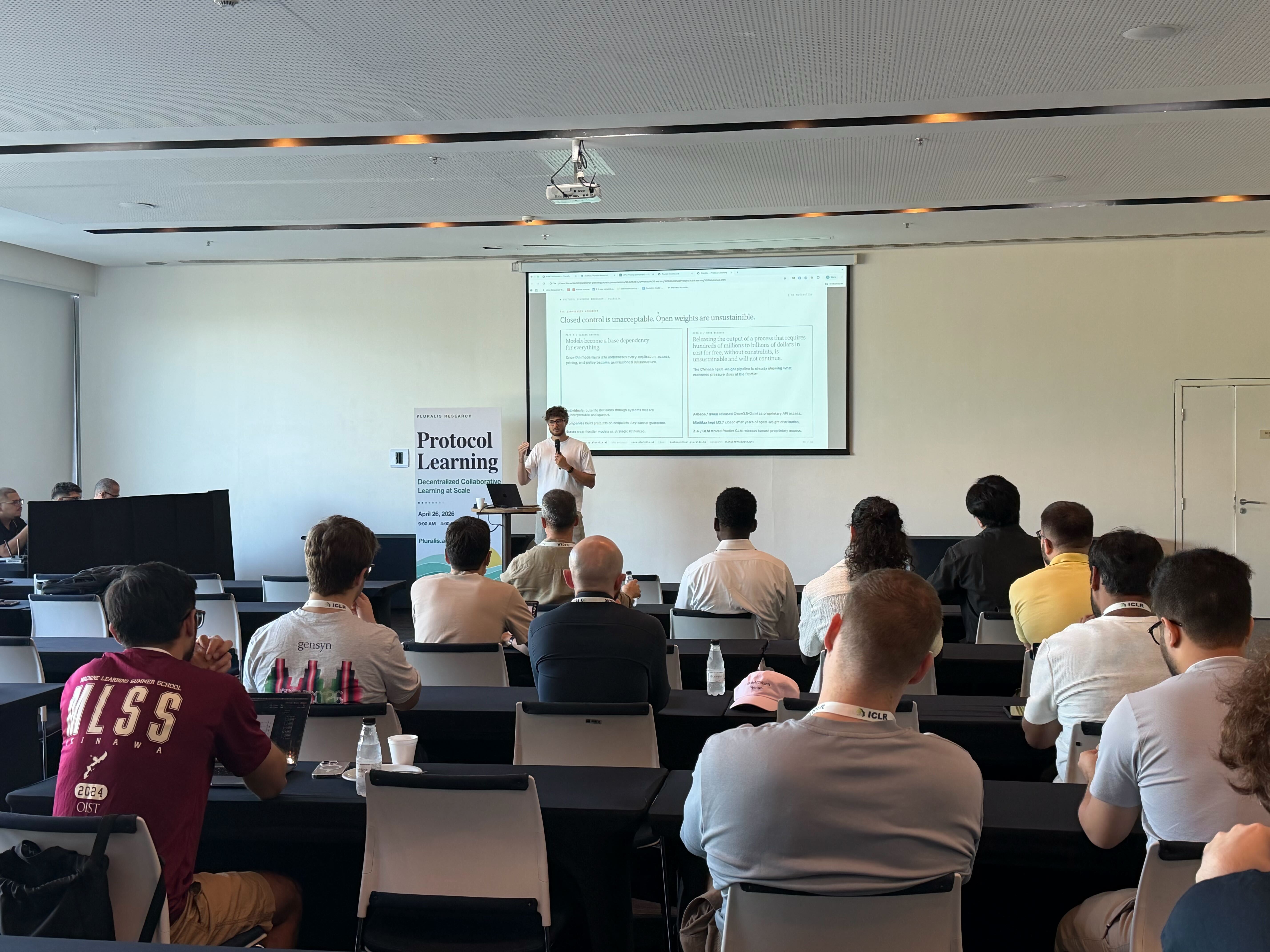 Speaker presenting to attendees at the Protocol Learning workshop
